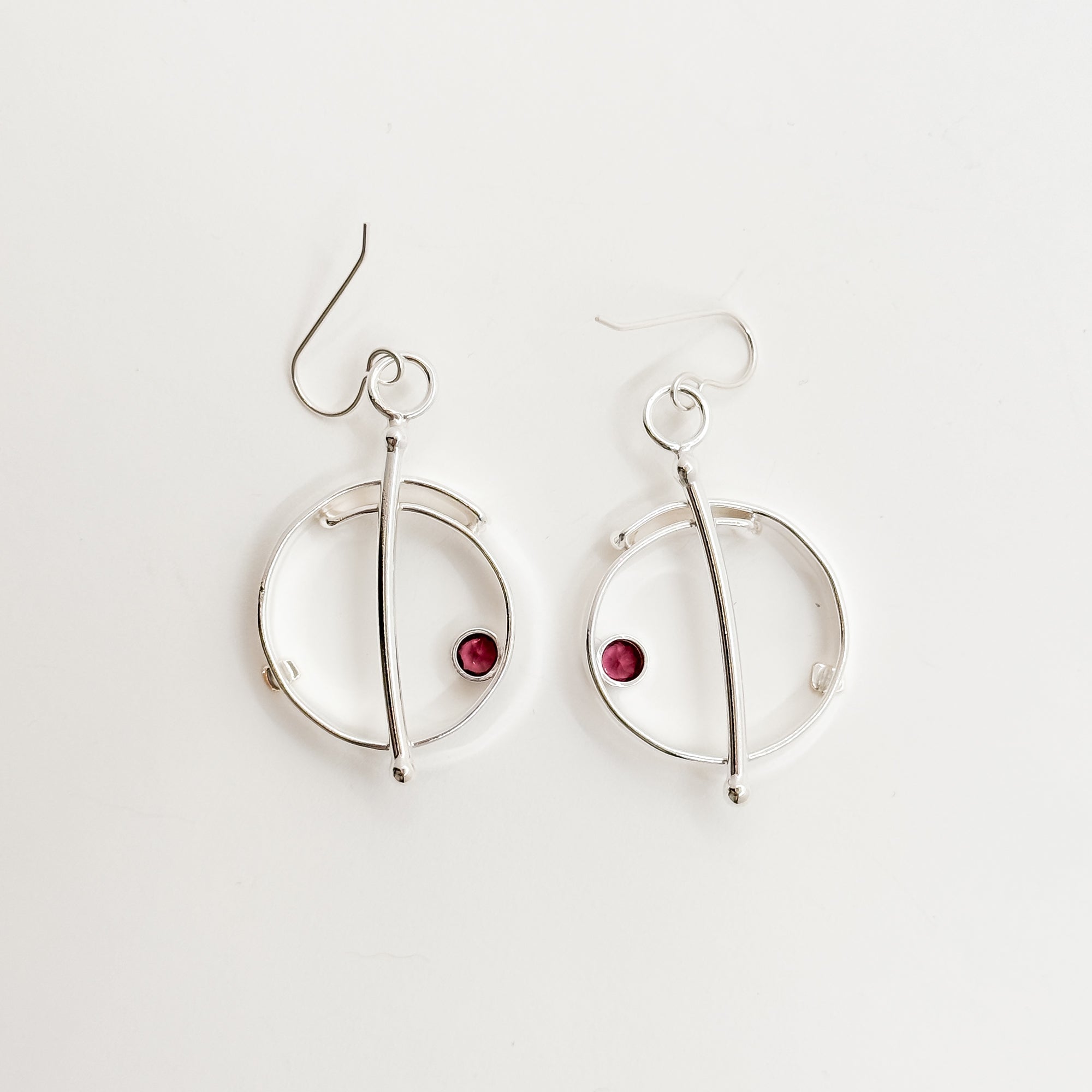 Saturn overlap earrings