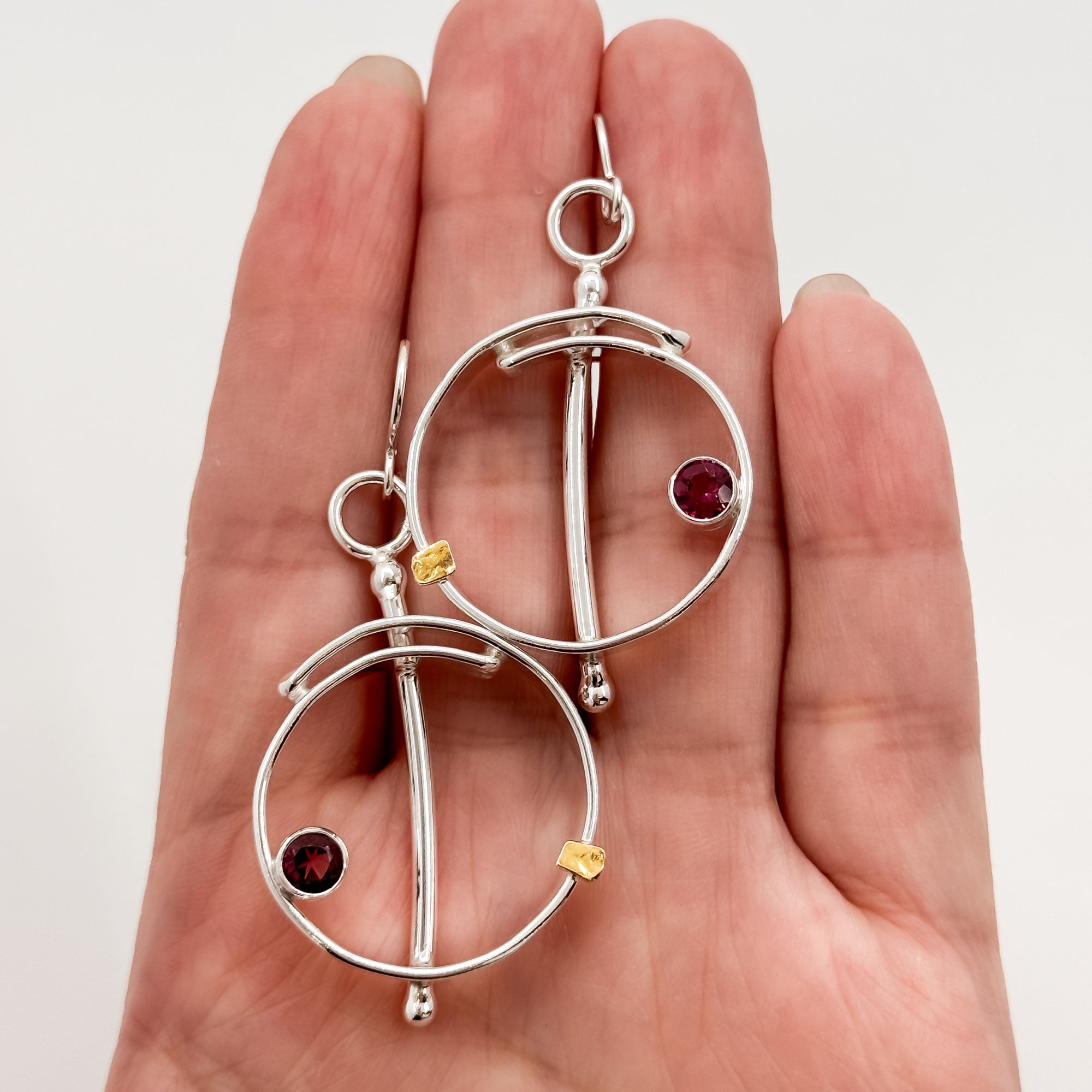 Saturn overlap earrings