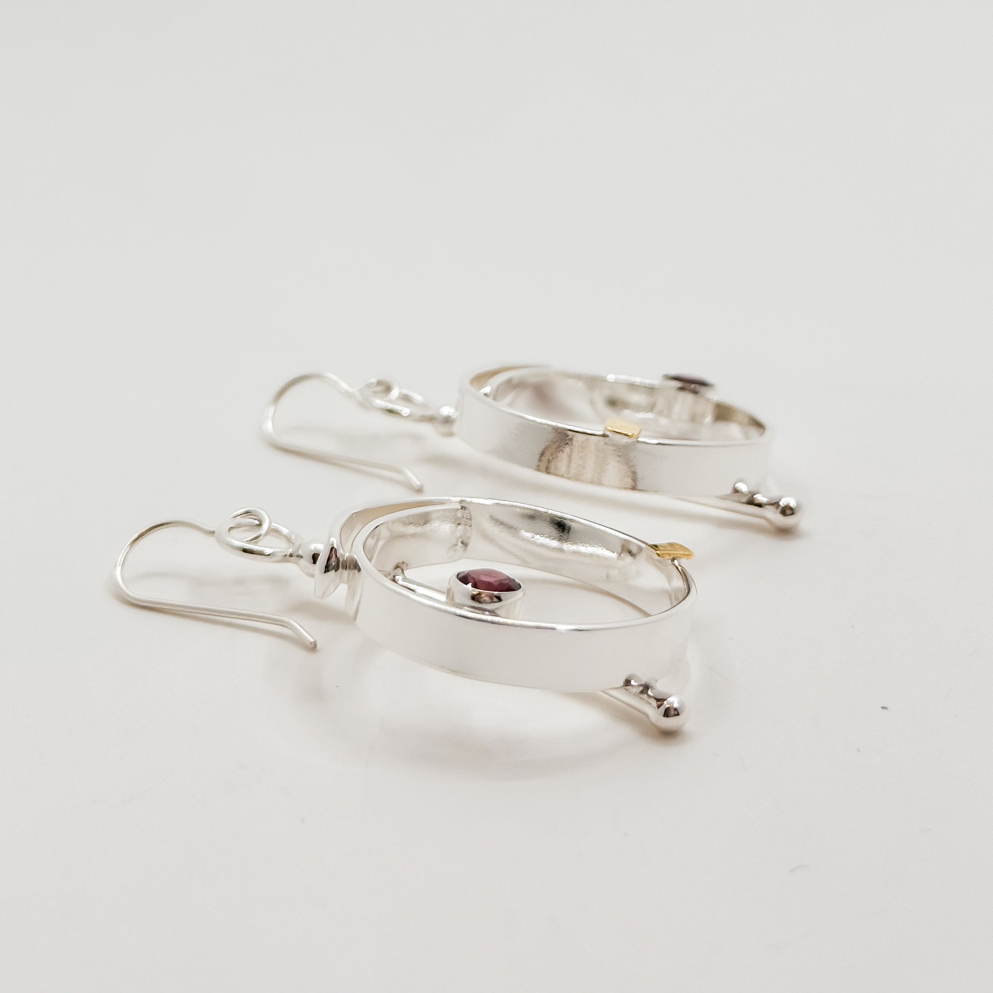 Saturn overlap earrings