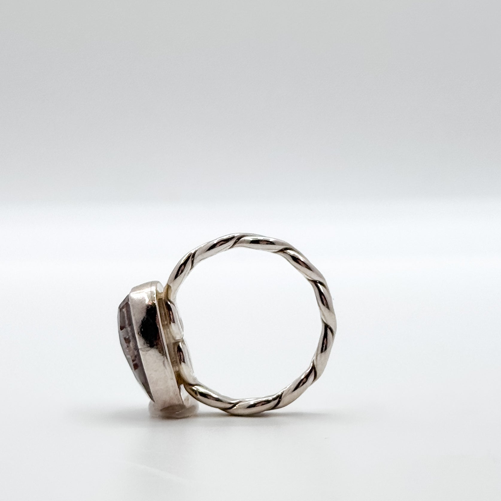 Red hematite quartz double twisted band ring