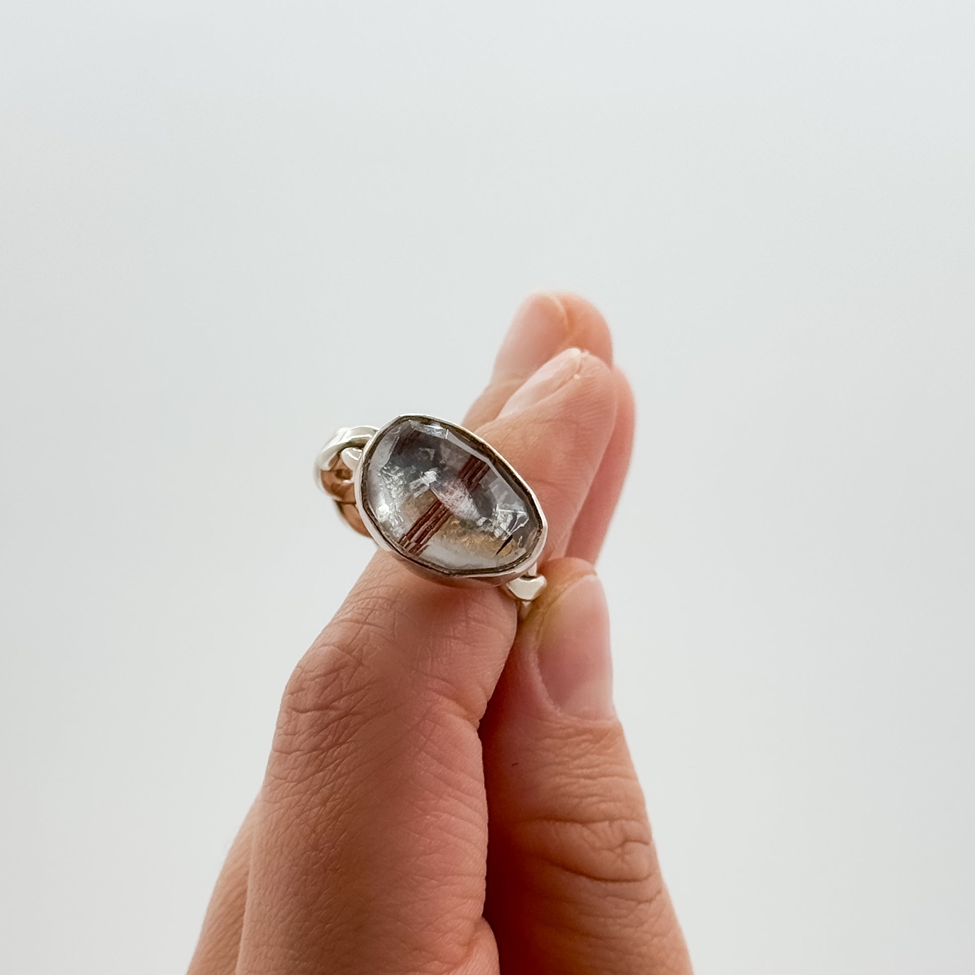 Red hematite quartz double twisted band ring