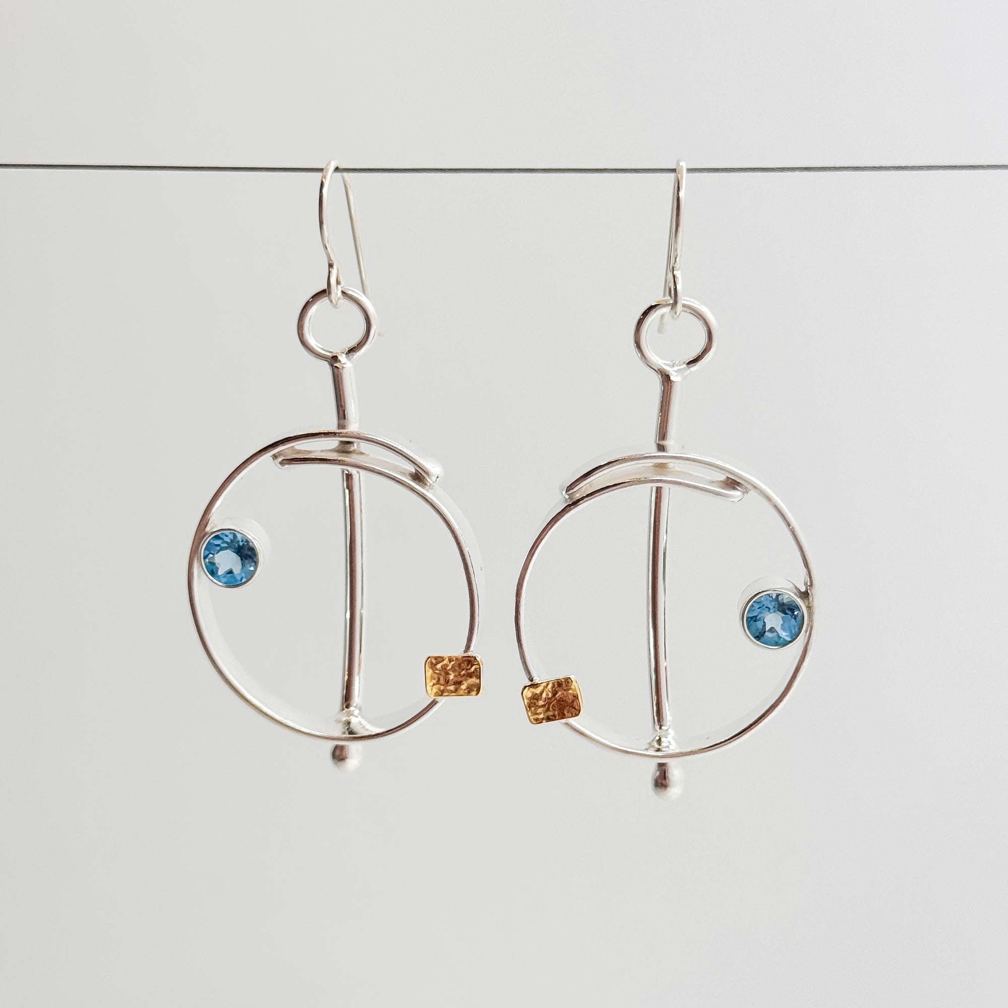 Saturn overlap earrings