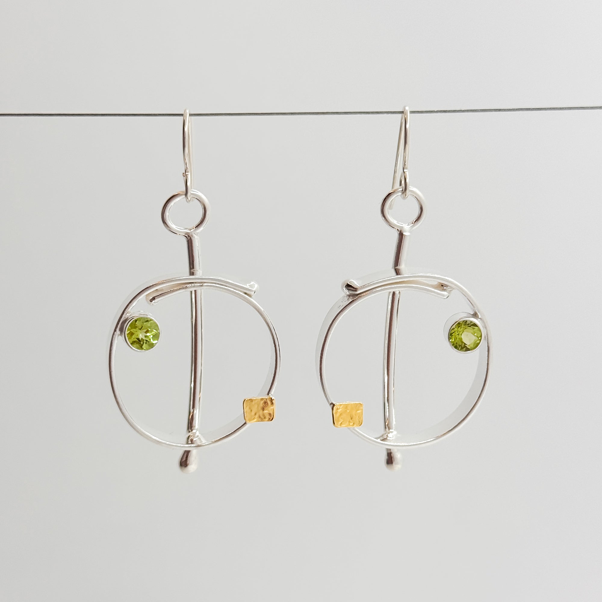 Saturn overlap earrings