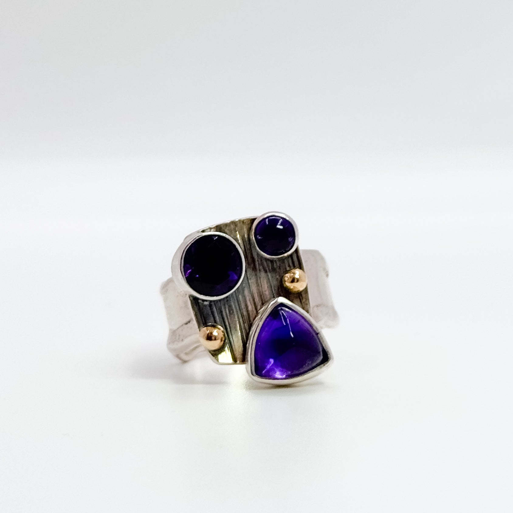 Half platter amethyst ring