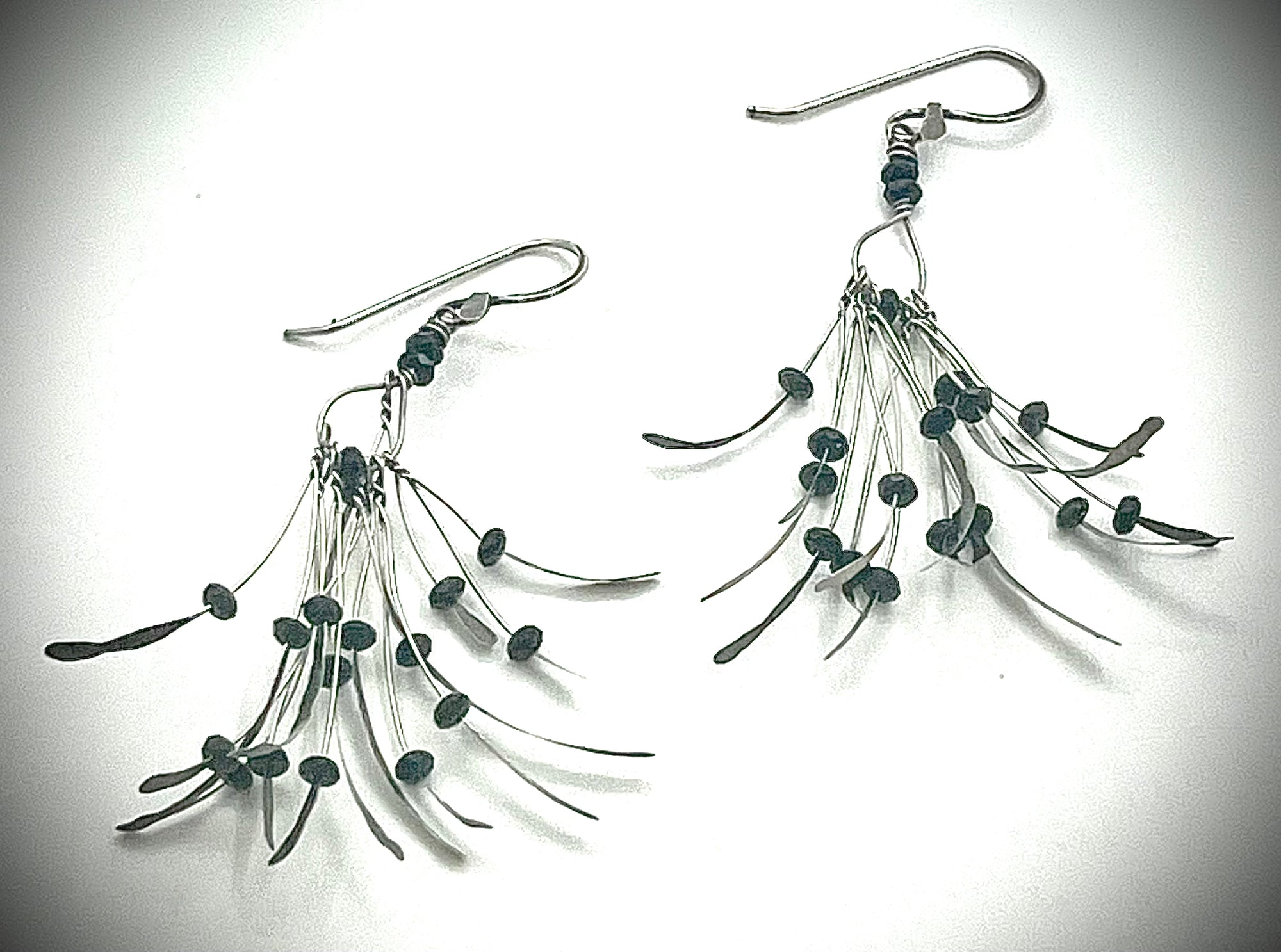 Short Boa Earrings with Black Garnet