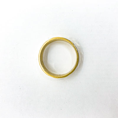 over top view of 8mm 14k Gold Hammered Band in size 8 by Judie Raiford
