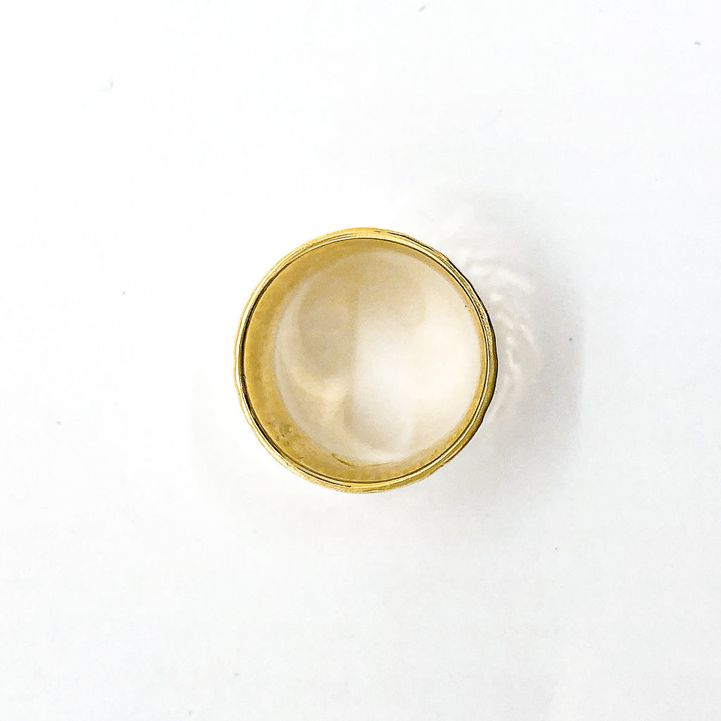 over top view of 14k Gold Wide Hammered Band by Judie Raiford