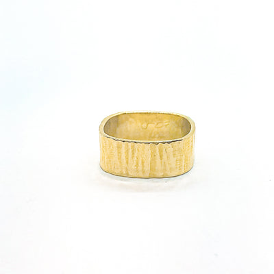 front view of 14k Gold Cross Pein Hammered Band by Judie Raiford