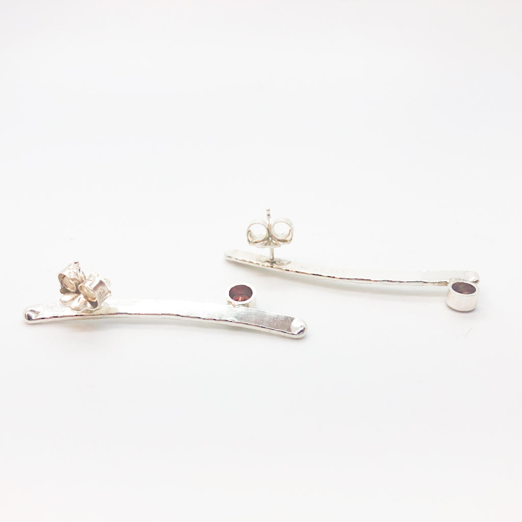 back side view of Sterling Short Arch Earrings with Garnet by Judie Raiford