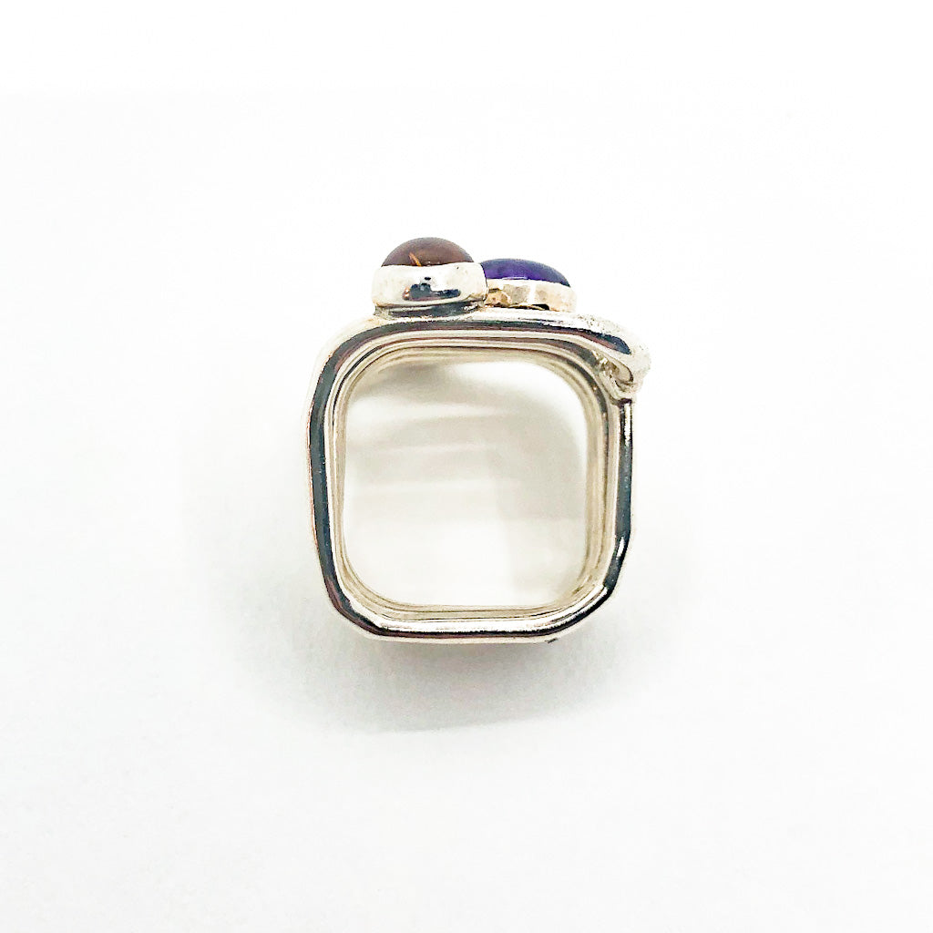 over top view of size 6.75 Sterling Square Wrap Ring with Lemon Citrine, Blue Topaz, and Amethyst by Judie Raiford