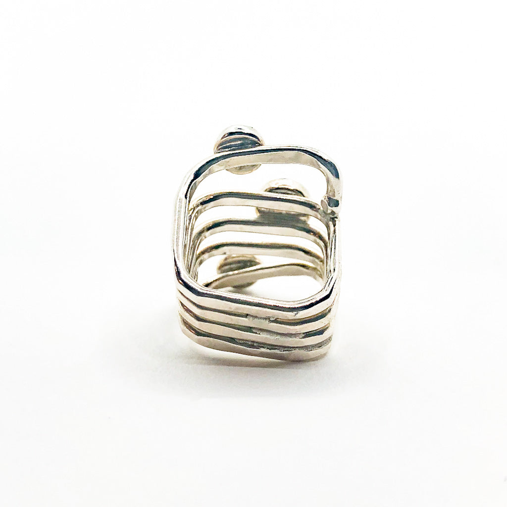 back side view of size 6.75 Sterling Square Wrap Ring with Lemon Citrine, Blue Topaz, and Amethyst by Judie Raiford