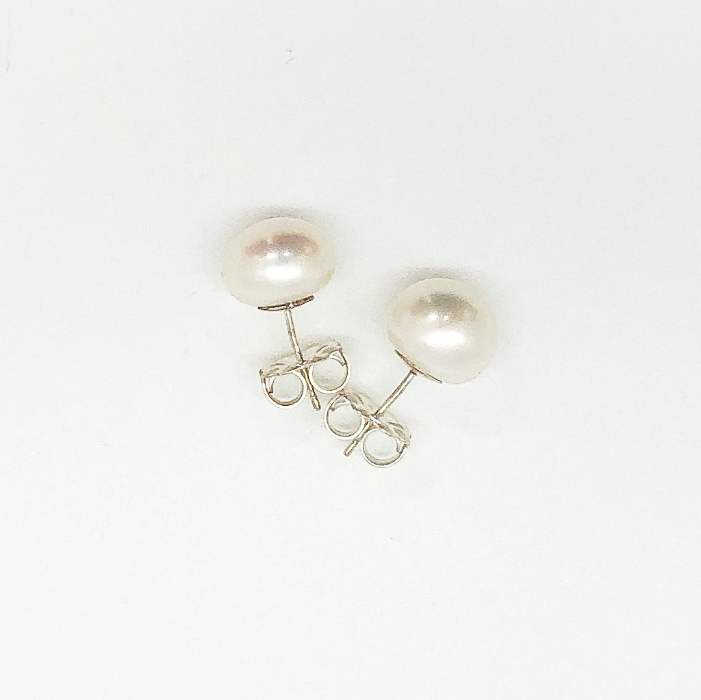 over top view of Extra Large 12mm White Pearl Stud Earrings by Judie Raiford