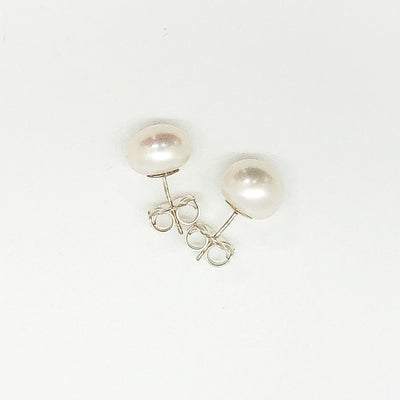 over top view of Extra Large 12mm White Pearl Stud Earrings by Judie Raiford
