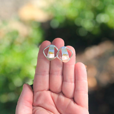 Square Lawa Earrings by Judie Raiford held in hand