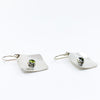 side angle view of Sterling Non Stick Earrings with Peridot by Judie Raiford