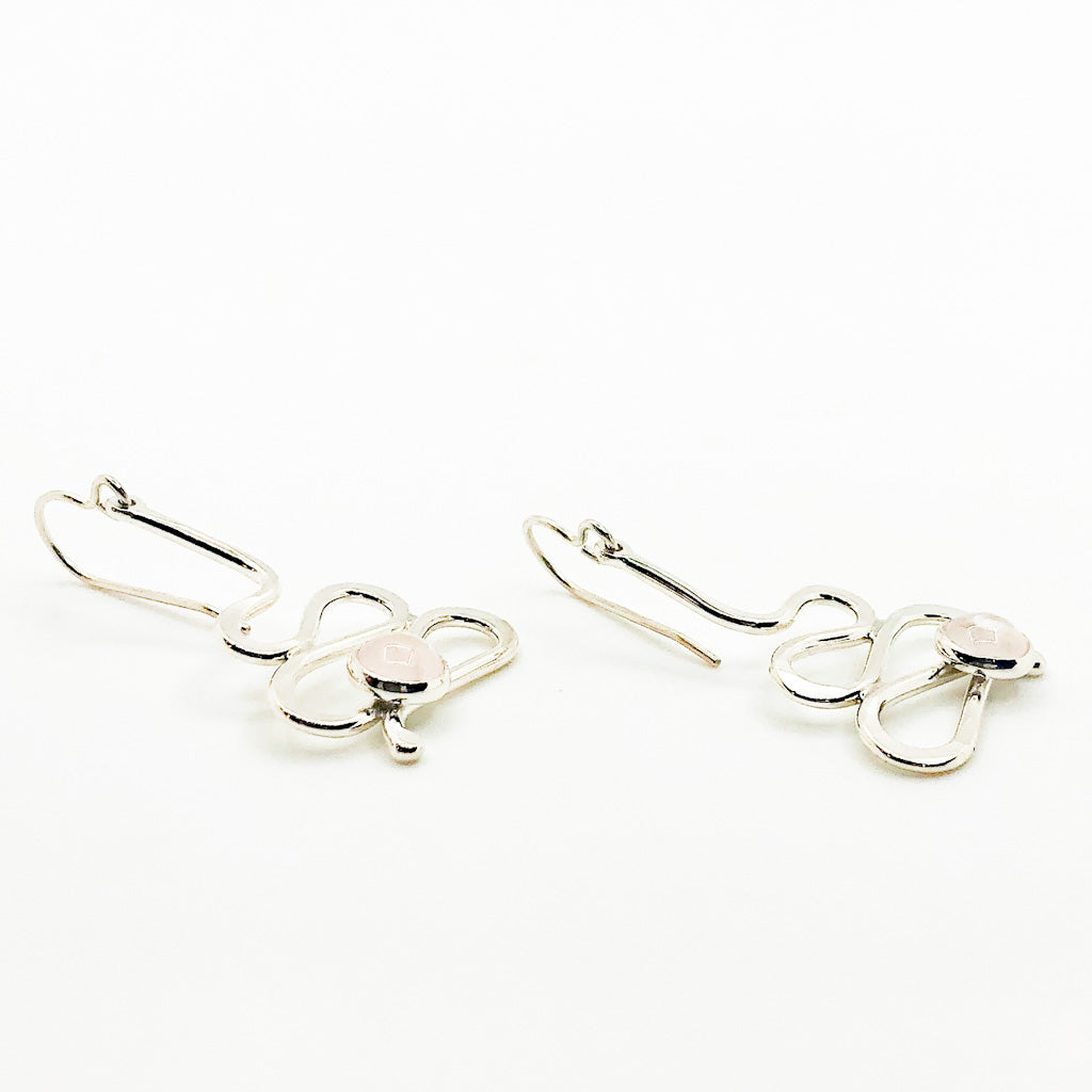 side angle view of Small Sterling Touch of Romance Earrings with Moonstone by Judie Raiford