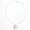 flat lay view of sterling silver Touch of Romance Necklace with Peridot by Judie Raiford