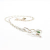 side angle view of sterling silver Touch of Romance Necklace with Peridot by Judie Raiford