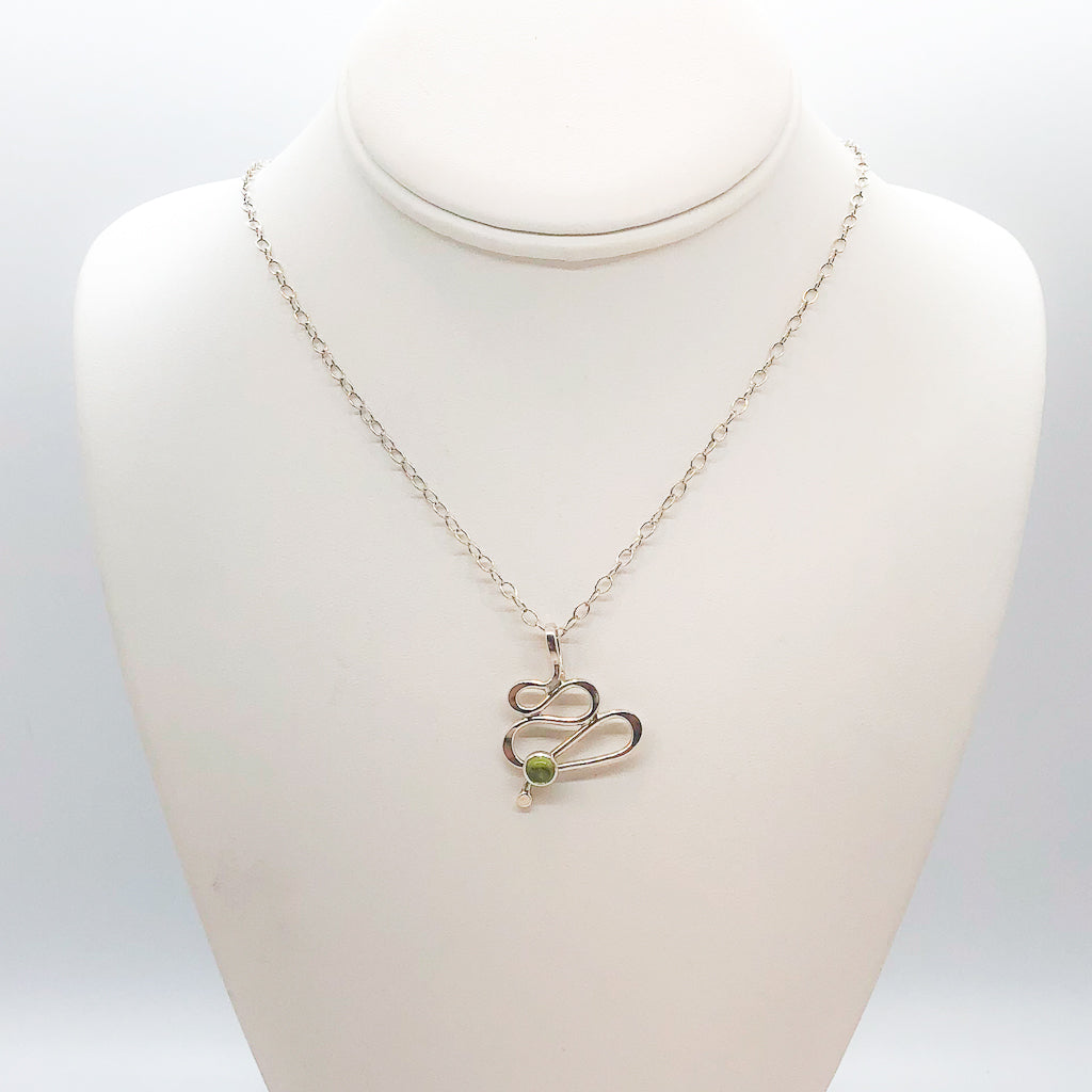 sterling silver Touch of Romance Necklace with Peridot by Judie Raiford on mannequin bust