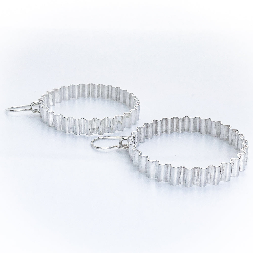 angle side view of Large Corrugated Hoop Earrings by Judie Raiford