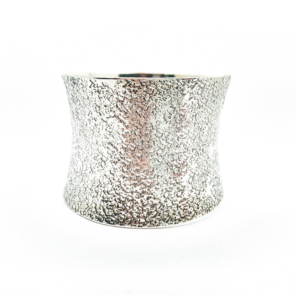 left side view of 1.5" Oxidized Sterling Wide Anticlastic Cuff by Judie Raiford