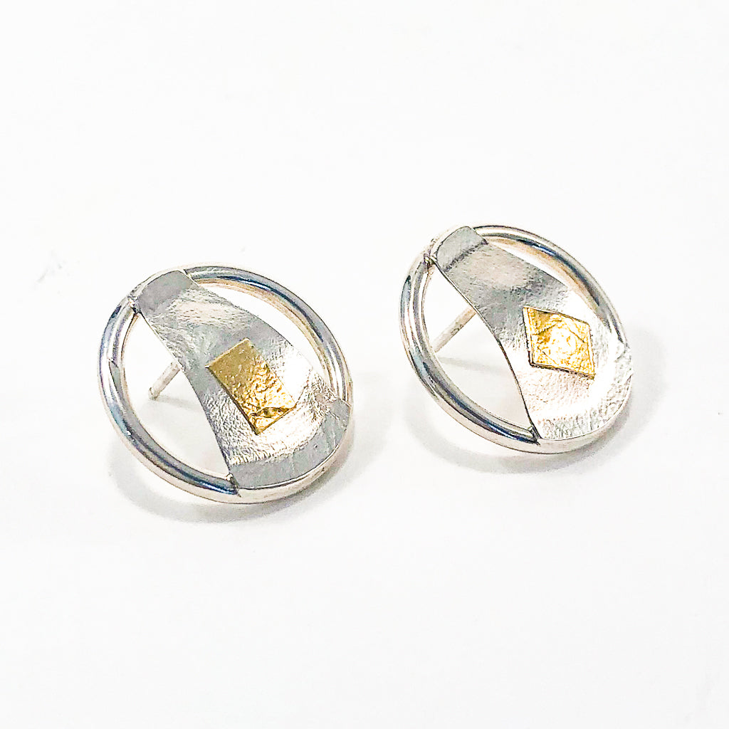 side angle view of Round Lawa Earrings by Judie Raiford