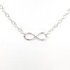 detail view of the pendant on sterling silver Infinity Maggie Necklace by Judie Raiford