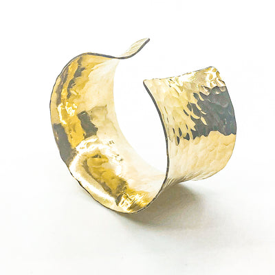 side angle view of 14k Gold Filled Ball Pein Anticlastic Cuff by Judie Raiford