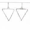 sterling silver Short Hammered Triangle Earrings by Judie Raiford hanging on wire