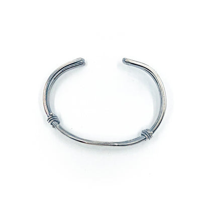over top view of Men's Oxidized Sterling Craig Cuff by Judie Raiford