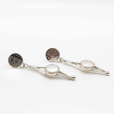 side angle view of Sterling silver Split Earrings with White Coin Pearl by Judie Raiford