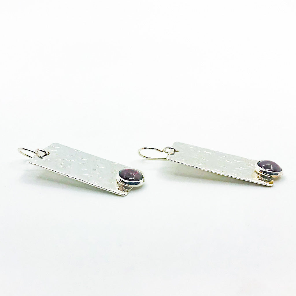 side angle view of Bubble Up Earrings with Garnet by Judie Raiford