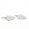 side angle view of Small Sterling Silver Corrugated Heart Earrings by Judie Raiford