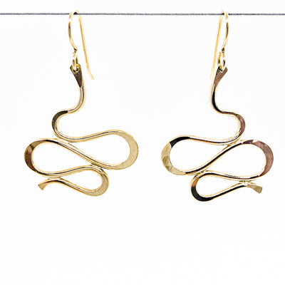 14k Gold Filled Touch of Romance Earrings by Judie Raiford hanging on a wire