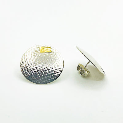 side angle view of Sterling and 24k Textured Dome Earrings by Judie Raiford