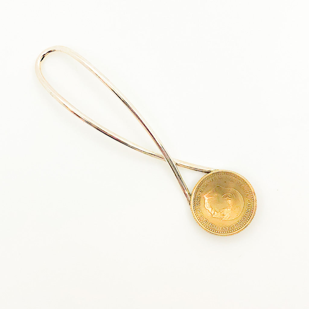 over top view of Sterling Salt Spoon with Coin by Judie Raiford