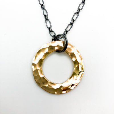 detail view of Oxidized Sterling & 14k Gold Filled Ball Pein Circle Necklace by Judie Raiford