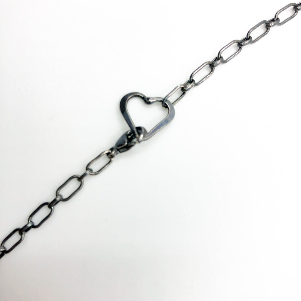 view of clasp with heart of Oxidized Sterling & 14k Gold Filled Ball Pein Circle Necklace by Judie Raiford