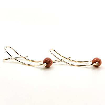 side view of Long Brewish Earrings with Goldstone by Judie Raiford
