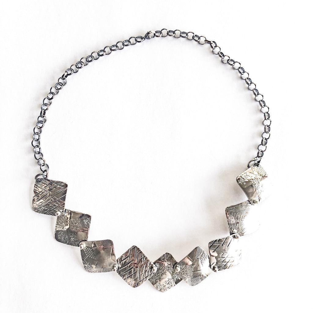 Oxidized Sterling Traveling Squares Necklace by  Judie Raiford