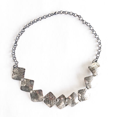 Oxidized Sterling Traveling Squares Necklace by  Judie Raiford