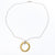 flat lay view of Sterling and 14k Gold Filled Ball Pein Hammered Circle Pendant Necklace by Judie Raiford