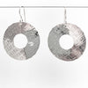 sterling silver Square Hammered Olive Earrings by Judie Raiford handing on wire