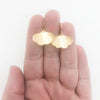 14k Gold Filled Mini Ginkgo Earrings by Judie Raiford held in hand