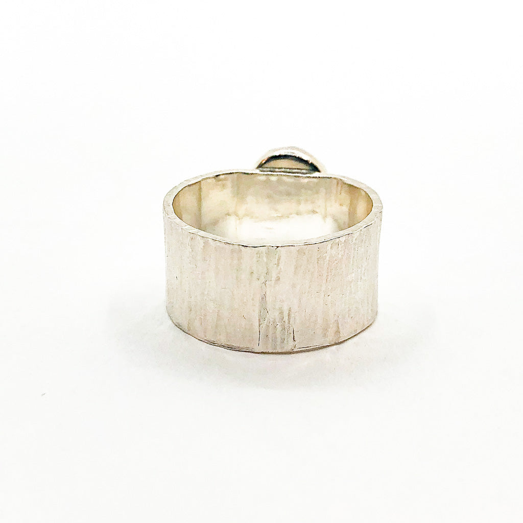 back side view of size 6.5 Sterling Cross Pein Hammered Ring with Amethyst by Judie Raiford