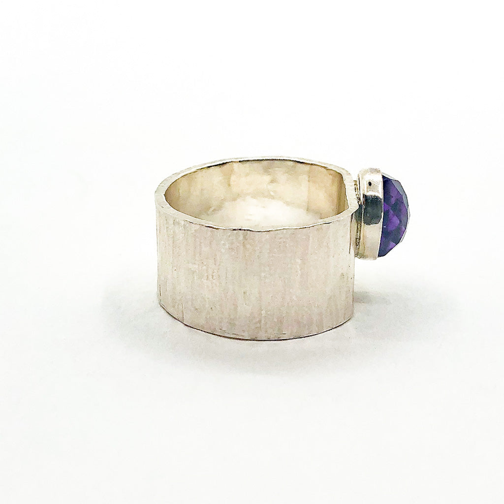 right side view of size 6.5 Sterling Cross Pein Hammered Ring with Amethyst by Judie Raiford