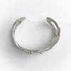 overhead view of Sterling Random Theory Bracelet by Judie Raiford