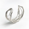 angle view of Sterling Random Theory Bracelet by Judie Raiford