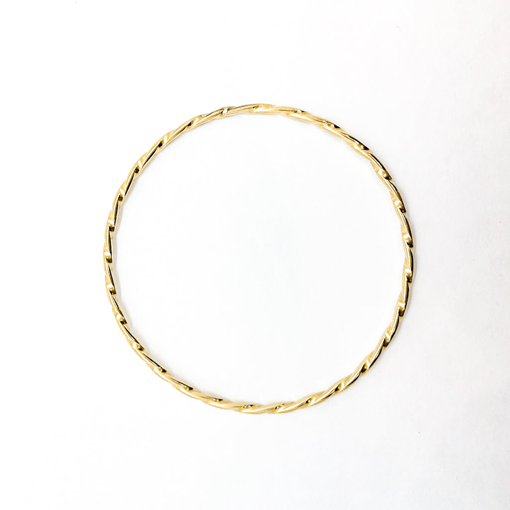 over top view of 14k Gold Filled Single Twist Bangle by Judie Raiford