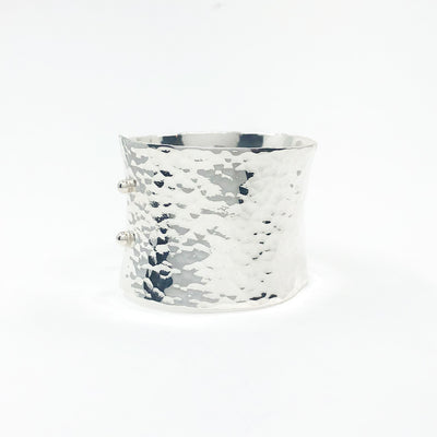 right side view of Sterling 1.5" Ball Pein Anticlastic Cuff by Judie Raiford